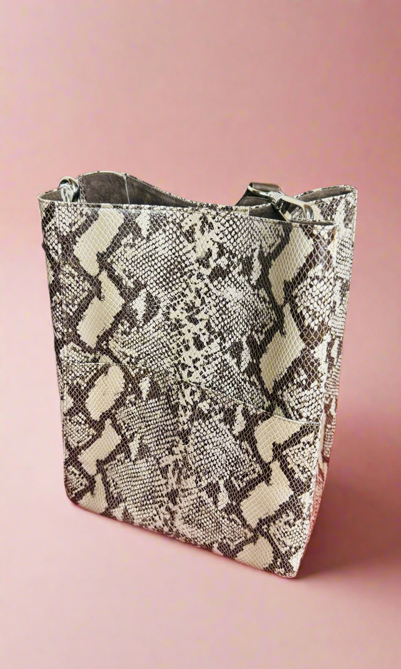 1- Bucket bag in snake print by Pessoa