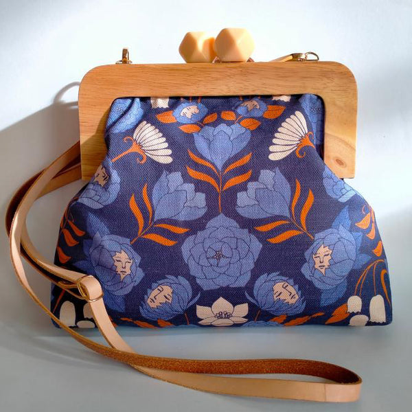 1- Minski bag in purple floral faces