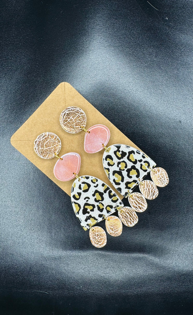 1- Long pastel and animal print earrings