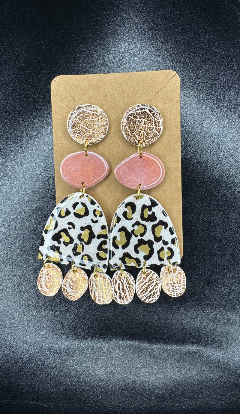 1- Long pastel and animal print earrings