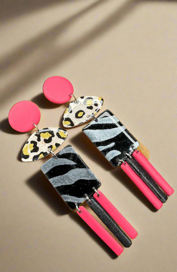 1- Long pink and animal print earrings