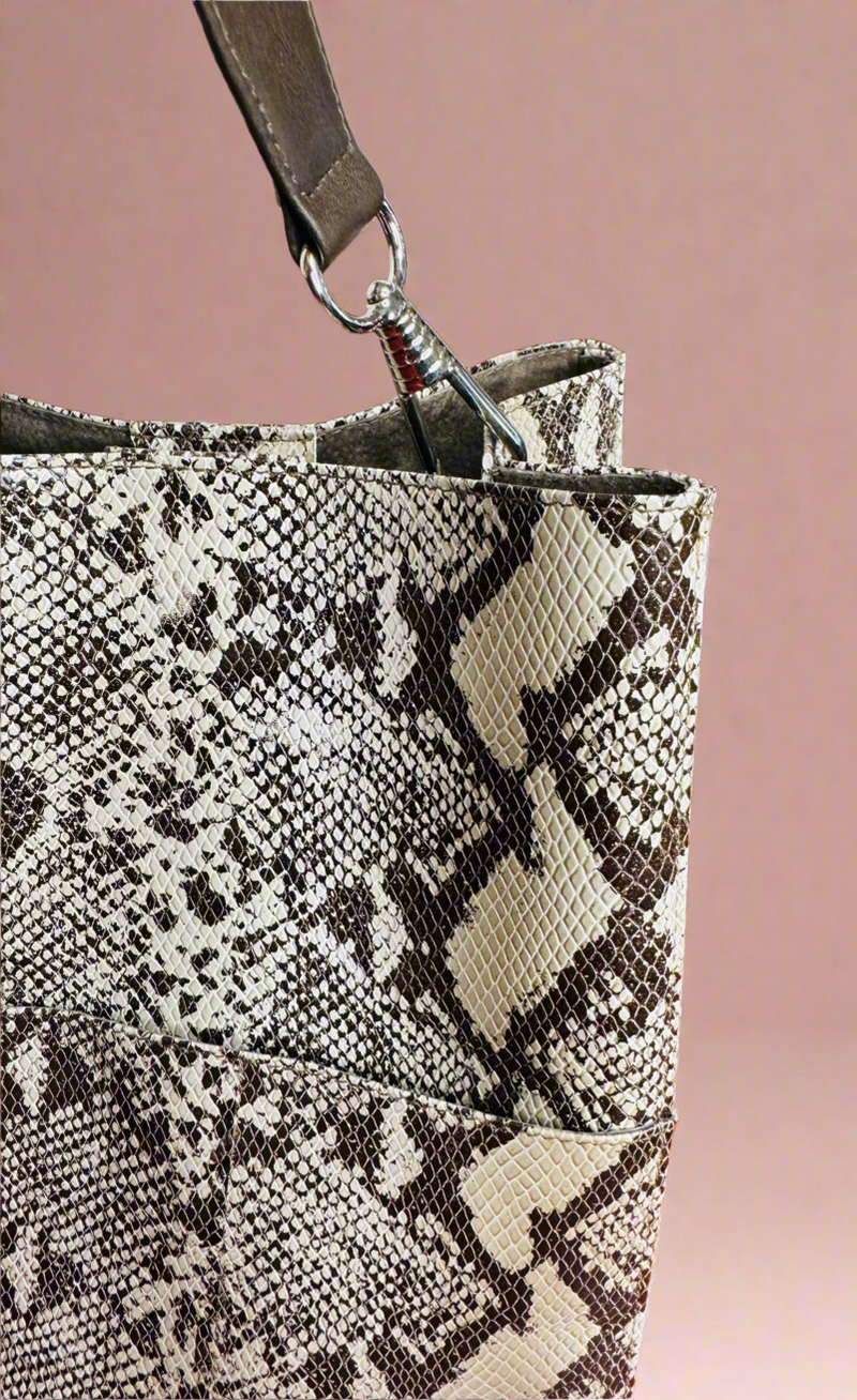 1- Bucket bag in snake print by Pessoa