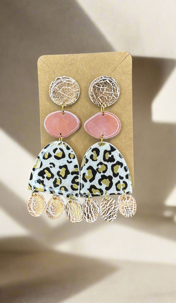 1- Long pastel and animal print earrings