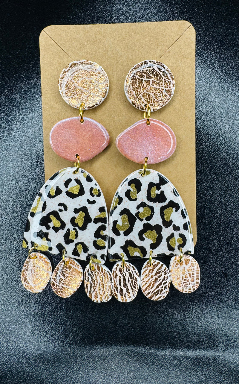 1- Long pastel and animal print earrings