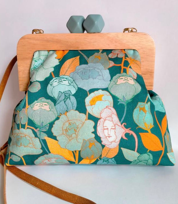 1- Minski bag in green floral faces